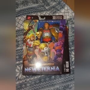 Mattel Masters of the Universe He-Man Figure with Red and Gold Armor